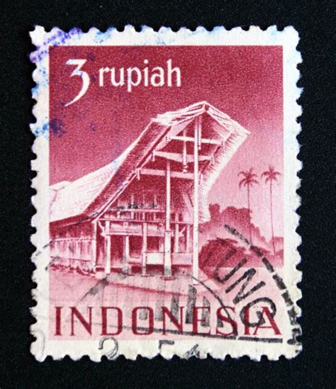 Sello Postal Indonesia 1949 Templos Y Edificios De La Casa Toraja Foto