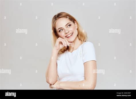 Cute Blonde White T Shirt Gesture With Hands Lifestyle Light Background Stock Photo Alamy
