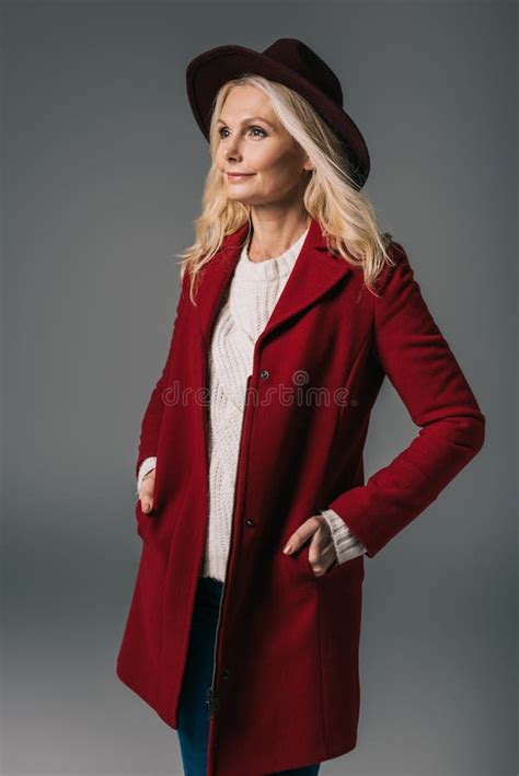 Beautiful Mature Woman In Red Coat And Hat Looking Away Stock Image Image Of Fashion Person