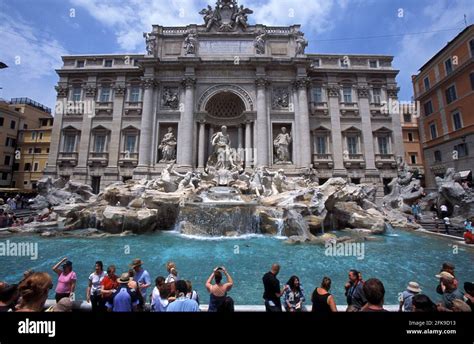 throwing coins  trevi fountain  res stock photography  images