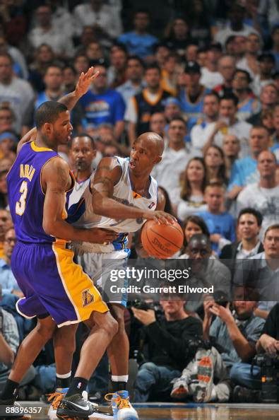 Chauncey Billups Of The Denver Nuggets Looks To Move The Ball Against