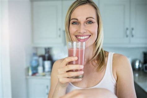 Pretty Blonde Woman Holding Her Homemade Smoothie Stock Photo Image Of Life Adult 66978550