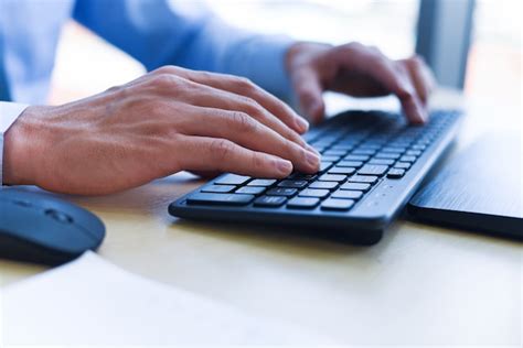 Premium Photo Close Up Of Typing Male Hand On Keyboard Concept