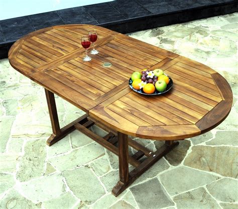 Table ovale de jardin en teck huilé avec rallonge papillon 120 180 x