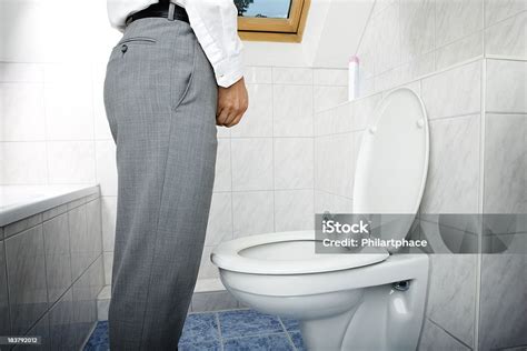 Man Urinating Standing Up Stock Photo - Download Image Now - Urinating ...