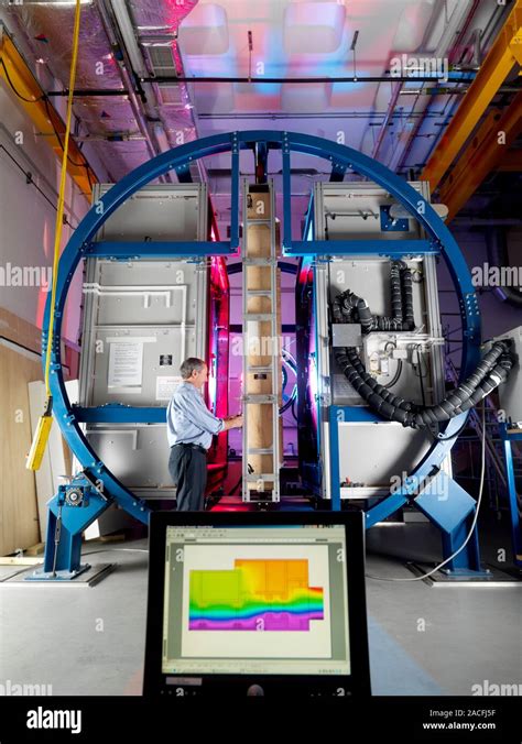 Thermal Transmittance Research Technician Adjusting A Rotatable Hot Box Which Is Used To