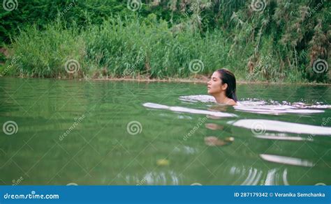 Relaxed Girl Swimming Green Waters Seductive Naked Woman Floating Lake Alone Stock Footage