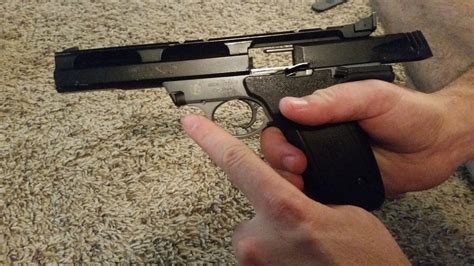 Field Stripping A Sandw 22a Pistol 4 Steps Instructables