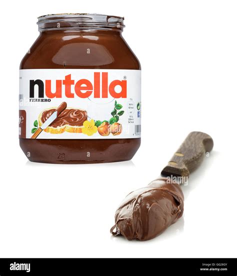 Pot de nutella avec propagation sur le couteau Photo Stock Alamy
