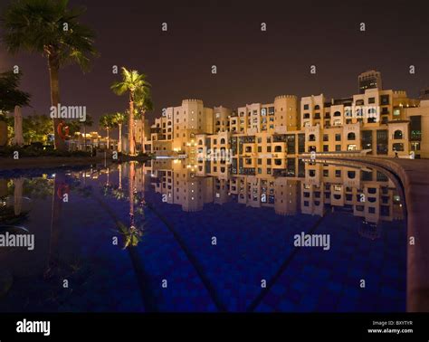 Swimming Pool Reflections At Night In Downtown Dubai Uae Stock Photo