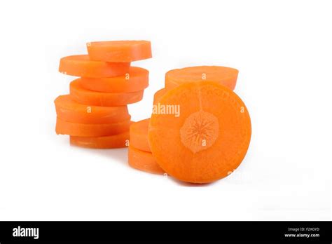 Fresh Slice Carrots On White Background Stock Photo Alamy