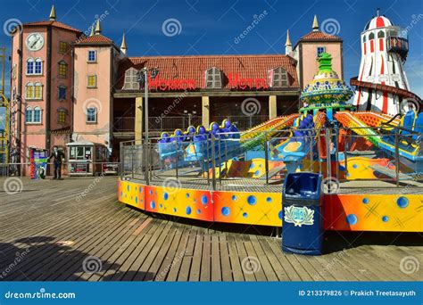 Amusement Park on the Palace Pier, a Pleasure Pier in Brighton, England ...