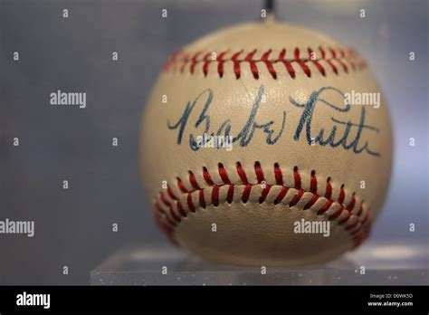 A Baseball Signed By Babe Ruth Sits Along Side Baseballs Signed By Yankees Players Past And