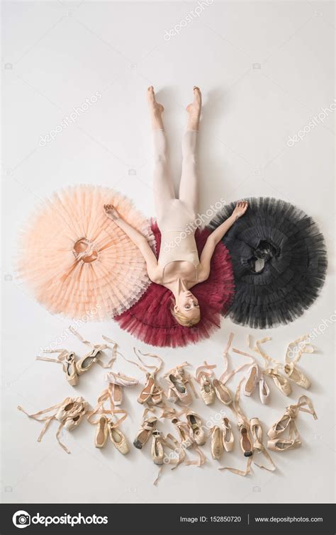 Blonde Ballerina Lies In Studio Stock Photo By Bezikus