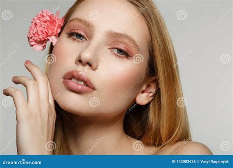 Close Up Portrait Of Dreamy Blonde Girl With Trendy Makeup Touching Her Face Stock Photo Image