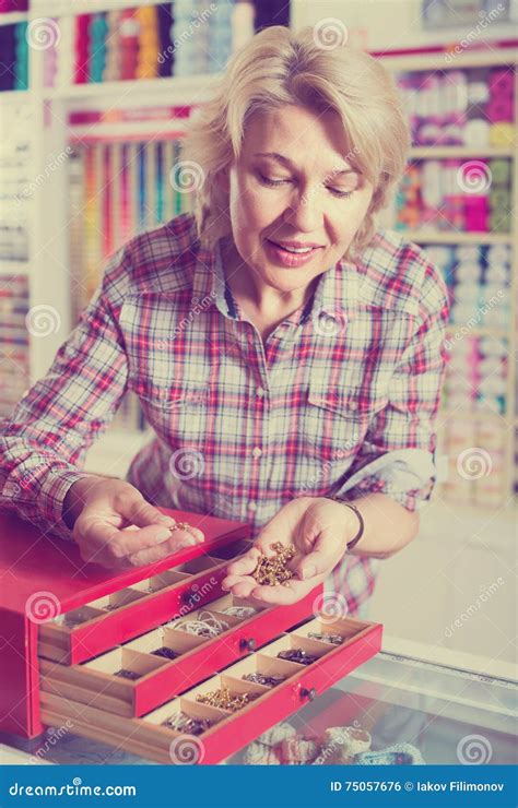 Mature Woman Customer In Sewing Store Stock Photo Image Of Glad Metallic
