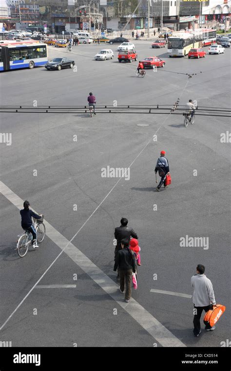 beijing people cross  large intersection stock photo alamy
