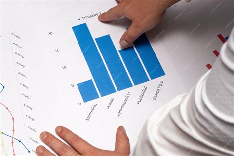 premium photo  person  working   chart   graph showing