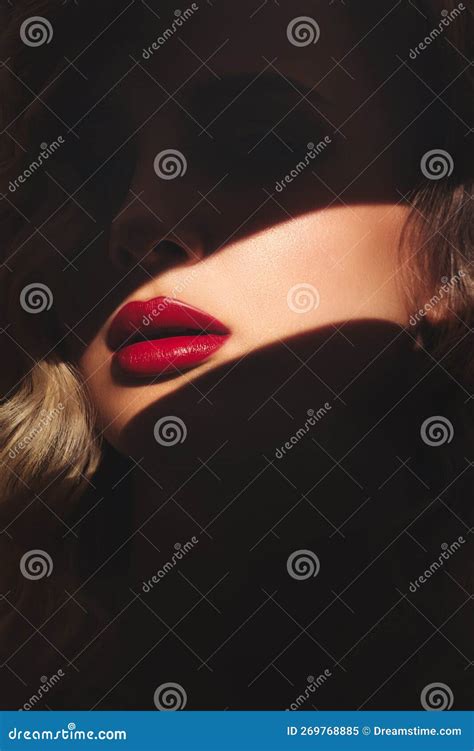 Bright Red Lips Of Blonde Woman Highlighted By A Streak Of Light Stock Image Image Of Pretty