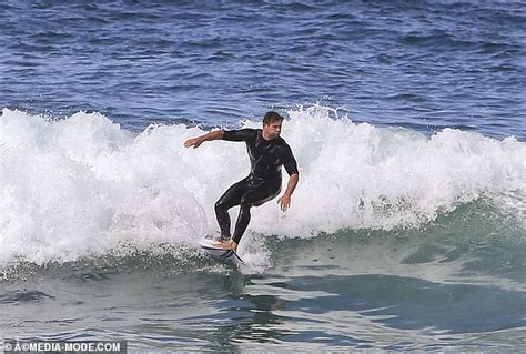 Chris And Liam Hemsworth Hit The Beach In Byron Bay With Bikini Clad Model Gabriella Brooks