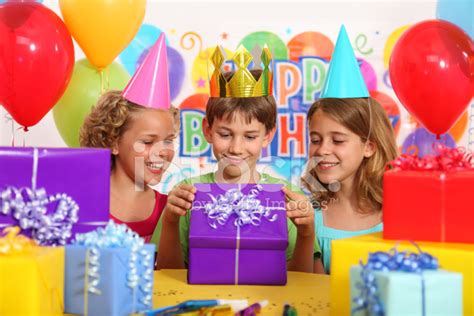 Opening A Birthday Present Stock Photo | Royalty-Free | FreeImages