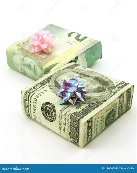 Dollars Wrapped Around Two Gifts with Bows Stock Image - Image of
