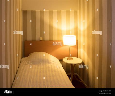 Simple Hotel Room Single Bed Stock Photo Alamy