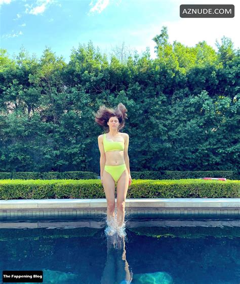 Alexandra Daddario Sexy Poses Showcasing Her Hot Bikini Body Wearing A Two Piece On Social Media