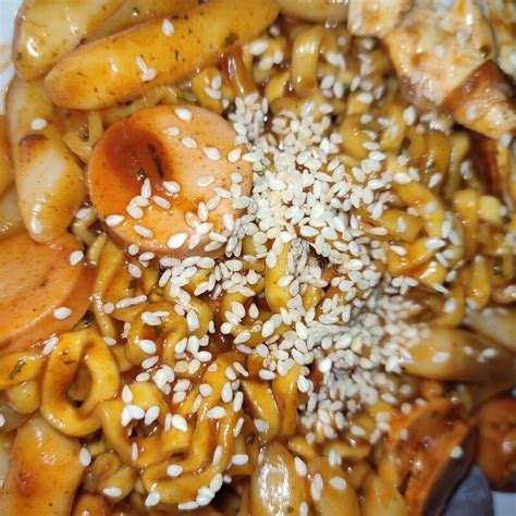 Delicious Spicy Tteokbokki Ramen With Sausage And Sesame Stock Image