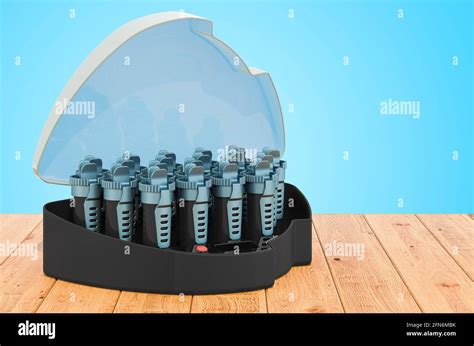 Compact Multi Size Hot Rollers On The Wooden Planks 3D Rendering Stock Photo Alamy