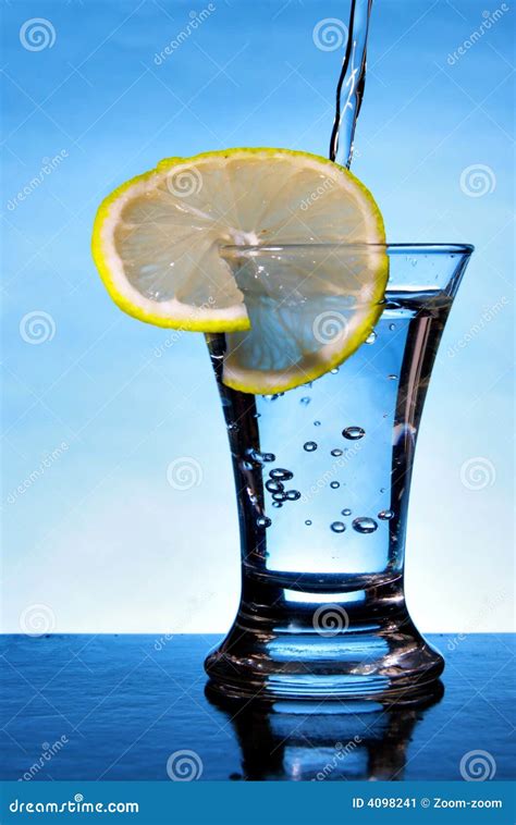 Alcoholic Beverage With Lemon Slice Stock Image Image Of Blue