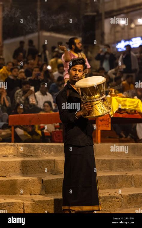 Ganga aarti, Portrait of an young priest performing river ganges ...