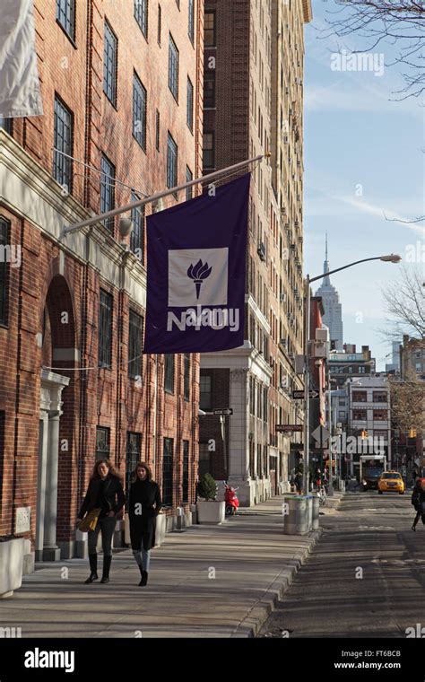 New York University buildings with the purple NYU logo flag hanging ...