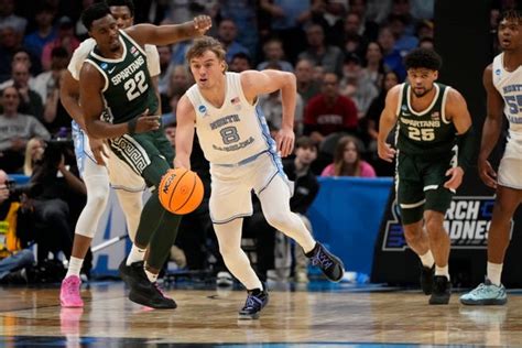 North Carolina Vs Michigan State In March Madness Photo Gallery