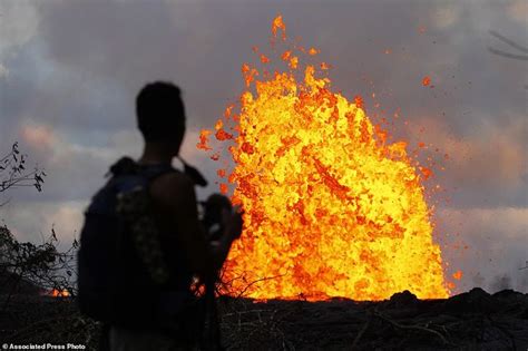 'Eerie' blue flames burn in cracks caused by Hawaii volcano | Hawaii ...