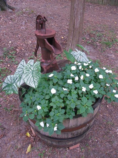 Half Whiskey Barrel Planter With Antique Water Pump Old Water Pumps