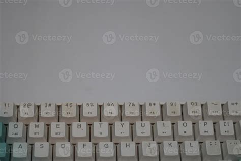 photo of a white and light blue computer keyboard 22928509 Stock Photo at Vecteezy