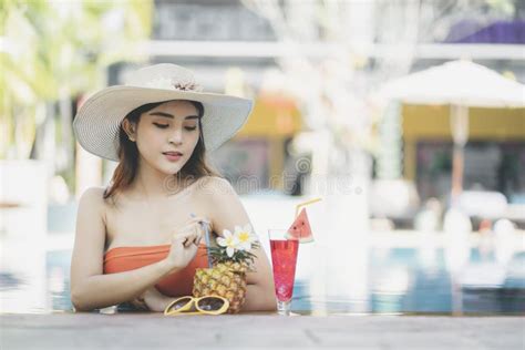 Beautiful Asain Women With Bikini Enjoy Summer Vacation In The Swimming