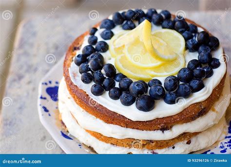 Lemon Blueberry Naked Cake With Blueberries On The Top And Mascarpone Butter Frosting Stock