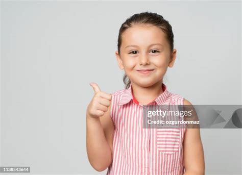 2587 Kid Smiling Thumbs Up Stock Photos High Res Pictures And Images