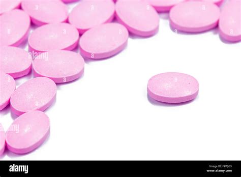 The Pink Tablets Isolated On White Background Stock Photo Alamy