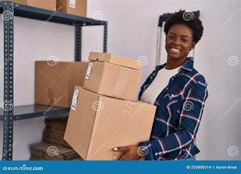 African American Woman Ecommerce Business Worker Holding Packages At