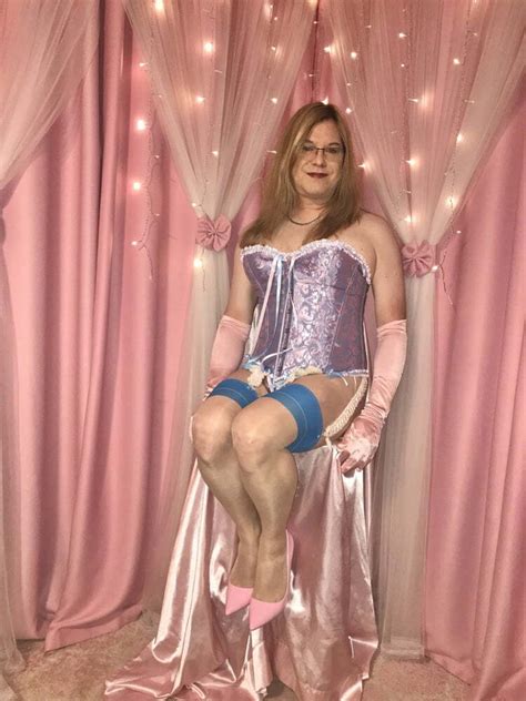 Joanie A Mature TV Wears And Models Her Pink And Blue Corset Photo AShemaletube