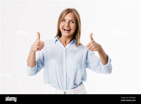 Image Of Happy Blonde Woman Showing Thumb Up And Smiling At Camera Isolated Over White