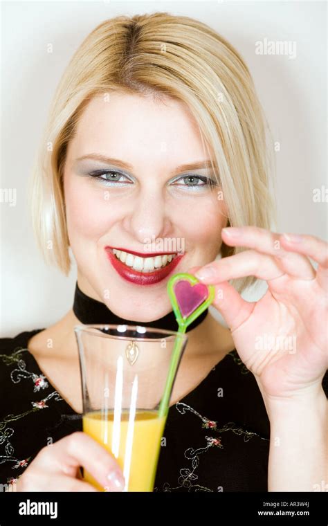 Blonde Women With An Cocktail Stock Photo Alamy