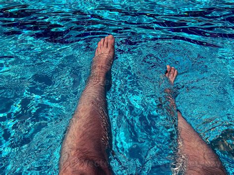 Relaxing At The Swimming Pool Man Relaxing Man Enjoying The Hot Summer At Swimming Pool