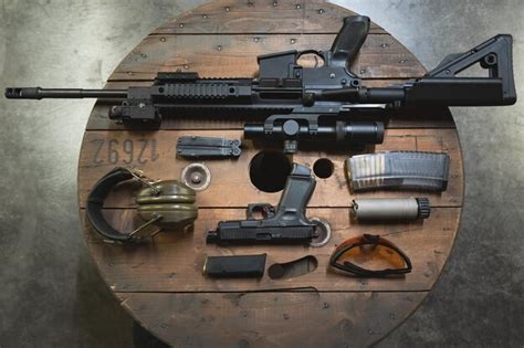 Premium Photo | Tactical weapons at a shooting range pistol and rifle ...