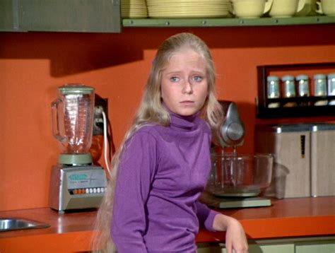 Celebrity - Eve Plumb, famously known for her role as Jan Brady on The