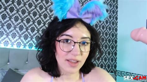 Nerdy Model With That Pink Dildo In Her Mouth