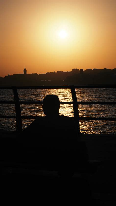 Silhouette of Person's Hands during Sunset · Free Stock Photo